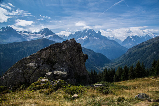 Rocky outcrop overlooking the Mont Blanc massif in the French Alps