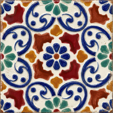A vibrant square ceramic tile featuring traditional hand painted Talavera patterns with intricate blue floral swirls and geometric terracotta accents for authentic interior design