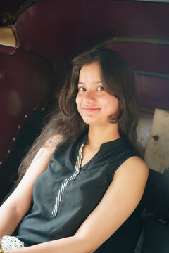 Portrait of a young Indian woman exploring Delhi at Connaught Place, Agrasen Ki Baoli and Chandni Chowk