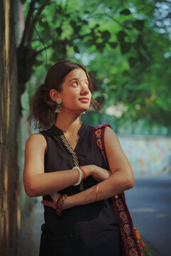 Portrait of a young Indian woman exploring Delhi at Connaught Place, Agrasen Ki Baoli and Chandni Chowk