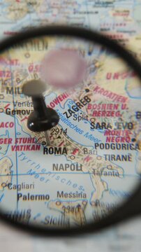 Focus on Roma in detail with magnifying glass