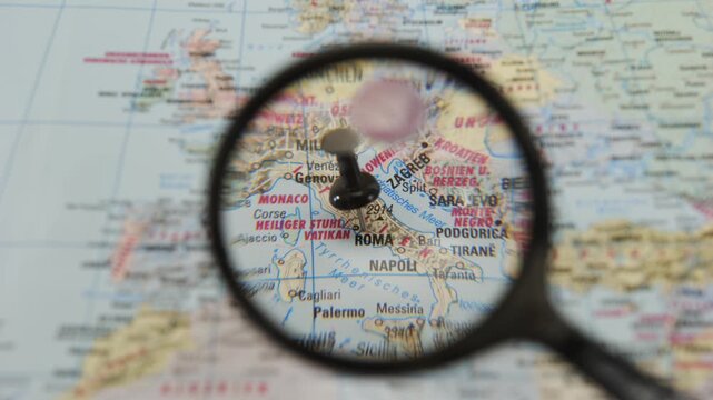 Focus on Roma in detail with magnifying glass