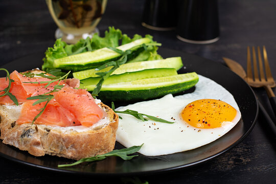 Clean Eating Breakfast with Salmon Sandwich and Cucumber