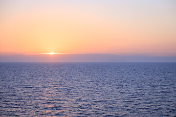 Fototapeta premium Sunset over the Mediterranean Sea with Golden Reflection