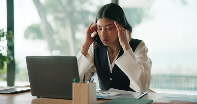 Woman, stress and headache in office with document, data mistake and frustrated by financial error. Tired, person and migraine with paperwork with wrong finance stats, laptop and work challenge.