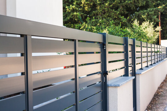 Modern fence with aluminum or metal shutter 