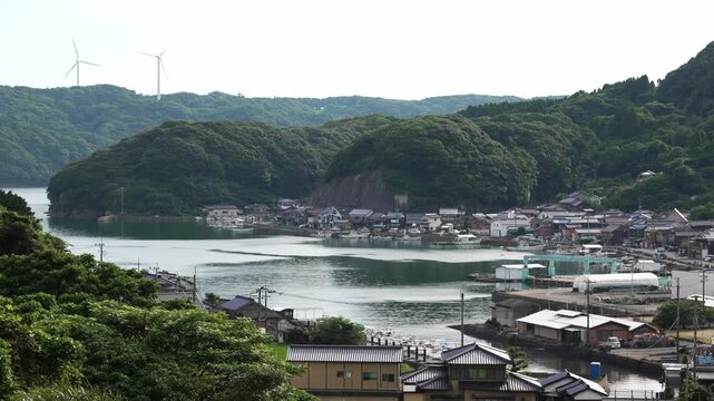 4K cinematic footage of a scenic coastal bay and local town in Genkai, Saga Prefecture, Japan