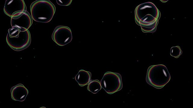 Iridescent soap bubbles floating on a black background