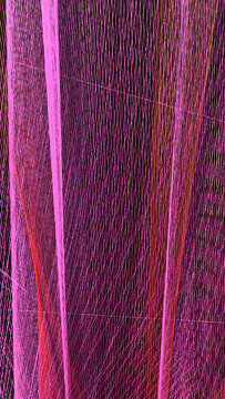 Pink and red woven textile mesh with interlaced threads close-up