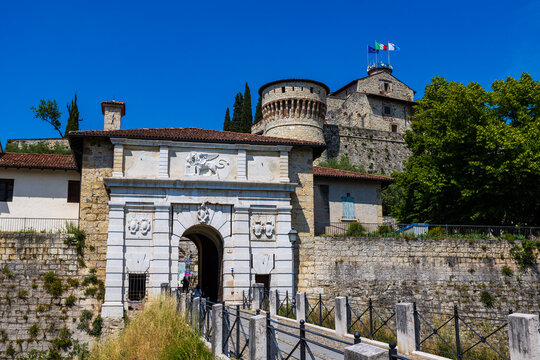 Monumental portal at the entrance of Brescia Castle, adorned with the Lion of Saint Mark, symbol of the Republic of Venice's domination over the city