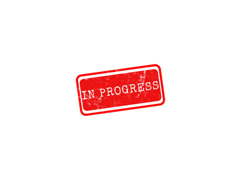 A red grunge in progress rubber stamp graphic with a distressed texture, ideal for business workflow and project management designs.