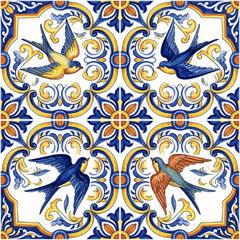 Fototapeta premium Seamless pattern of traditional Mediterranean ceramic tiles featuring hand-painted swallow birds and ornate blue and yellow floral scrollwork for elegant interior design decoration