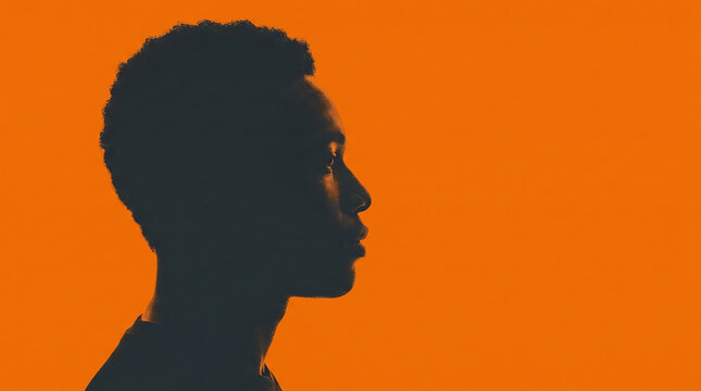 Man Profile Silhouette on Orange Background Halloween Portrait Concept