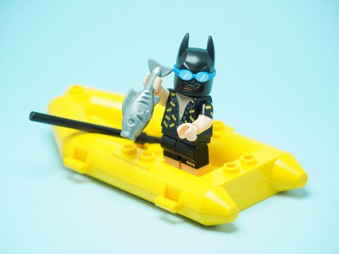 Indonesia - August 25, 2023 : Mini toy of lego with blurred background. Fishing concept design.