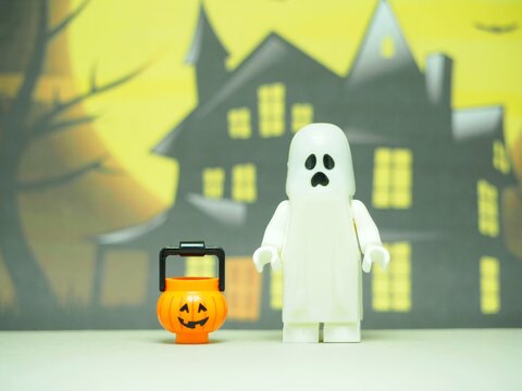 Indonesia - September 11, 2023 : Mini toy at table with blurred background. Halloween party concept design.