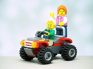 Obraz premium Indonesia - August 16, 2023 : Mini toy at table with blurred background.