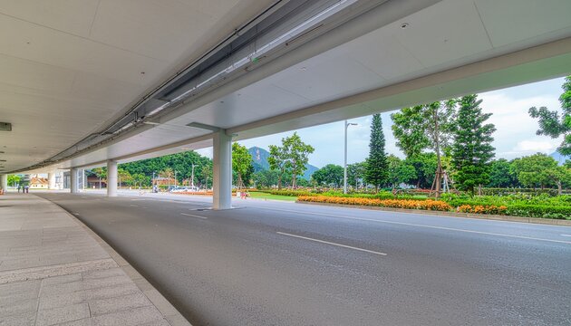 モダンな建築屋根と綺麗な道路・緑豊かな公園（都市景観, インフラ, 建築デザイン, 交通, 背景素材） / Modern architecture and empty road with green park background