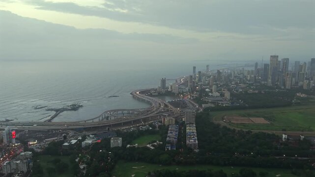Aerial Evening View of Mumbai Coastal Road Haji Ali Dargah and Mumbai Skyline Maharashtra