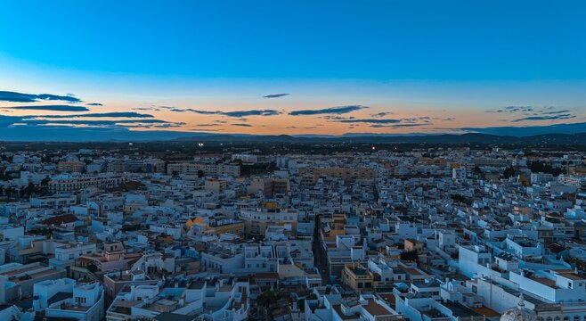Twilight Aerial Blue Hour Panorama of White Cubist Town of Olhao Algarve