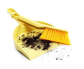 Cleaning broom and dustpan with soil isolated on white