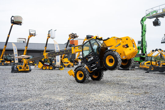 09.11.2026 - Lviv, Ukraine: JCB construction machinery displayed at a construction equipment exhibition, showcasing heavy machinery, excavators and industrial equipment for visitors and industry profe
