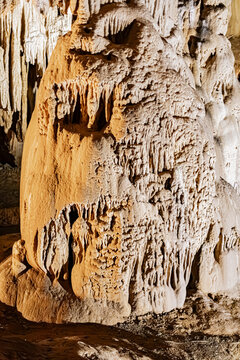 Limestone column formed by the junction of stalactites and stalagmites in a cave, Pyrenees, France