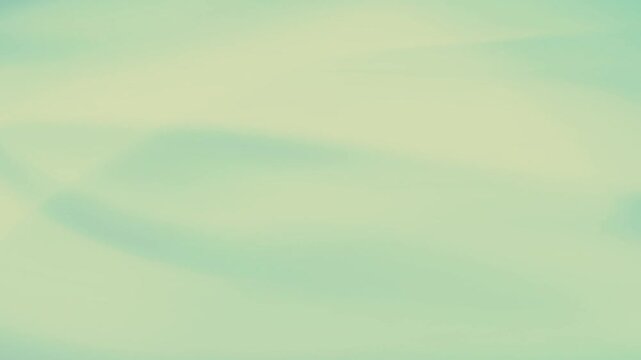 Soft mint green abstract waves flowing in smooth motion as a digital animation video clip for professional creative backgrounds