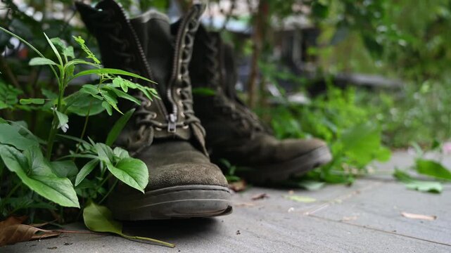 Worn Taiwanese Military Boots on Grass with Weathered Texture