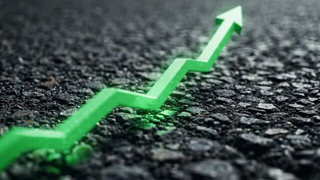 Green rising arrow chart symbol on dark asphalt road surface with business progress economic