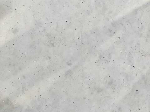 Smooth Cast Architectural Raw Concrete Surface Texture Background with Micro-Pores