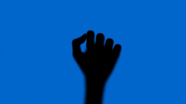 Creepy Monster Hand Silhouette with Claws Behind Glass on Blue Background