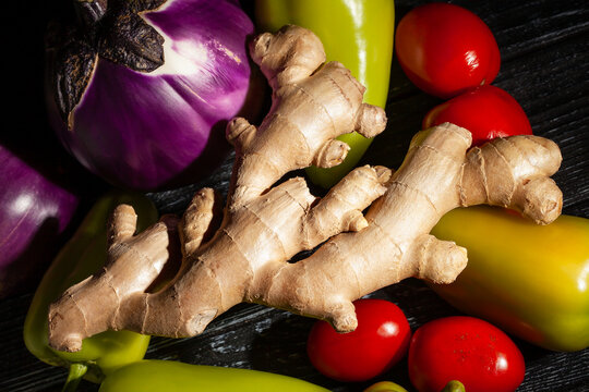ginger vegetable mix on black wood background