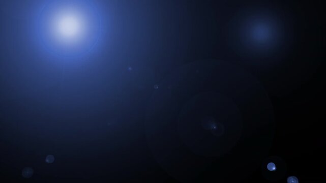 Cinematic blue lens flare pulse glowing on dark background. 4k