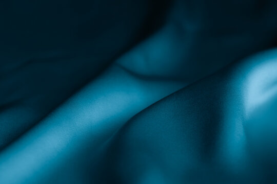 Smooth Dark Blue Silk Fabric Texture with Soft Waves