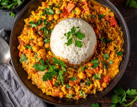 Egyptian koshari layered rice lentils chickpeas top view