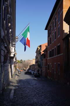Italian flag hanging in front a hotel in rome