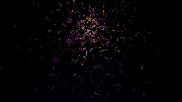Colorful Crystal Shards Exploding in Burst of Light on Black Background
