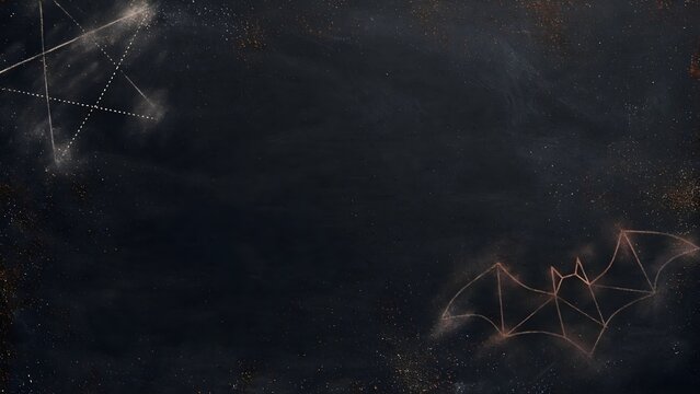 Abstract Halloween background of a dark chalkboard surface with fine orange white chalk dust faint geometric bat star smudges and subtle grain in a clean dark mode aesthetic copy space.