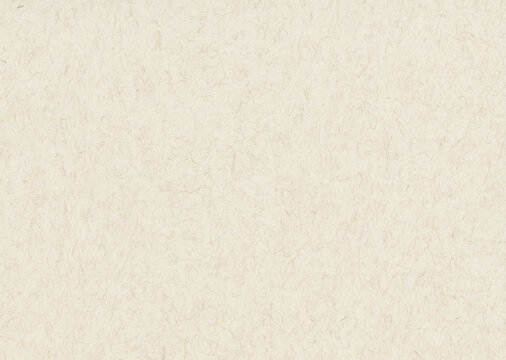 Notepaper grain formed by tangled cream fibers supplies a background for calligraphy, short embedded strands covering the blank sheet intended for invitation cards or personal journal pages