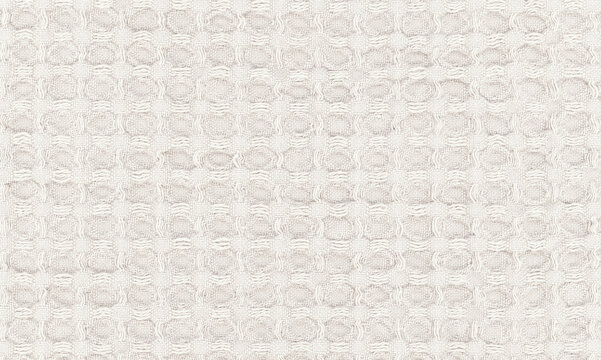 Waffle cells outlined in white thread define a honeycomb fabric background, their recessed centers bringing a raised woven texture to digital collage and the surface of scrapbook covers