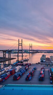 Vertical video, 4k Time lapse Aerial view of  Pyeongtaek Port and sunset Sky,South Korea