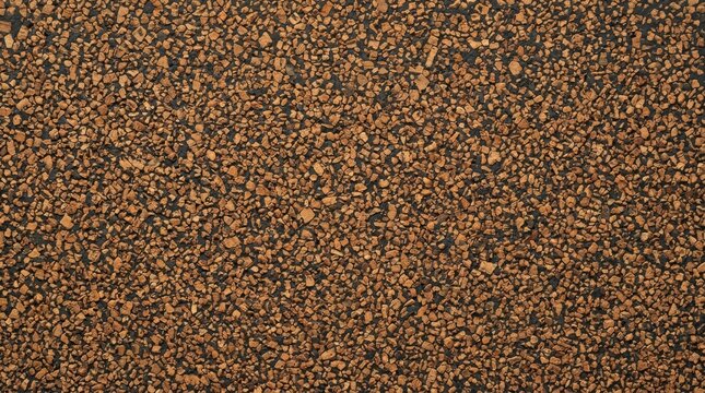 Close up view of natural cork texture background with small brown particles and dark binder for interior design flooring