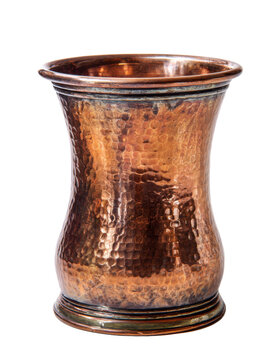 A vintage hammered copper vase with a rich, aged patina and a distinctive hourglass silhouette, perfect for decorative display