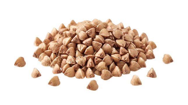 A pile of buckwheat groats against a black background healthy whole grain