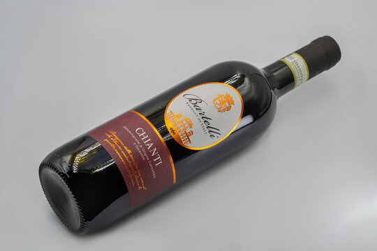 Bartelli Chianti Italian red wine bottle closeup on white.