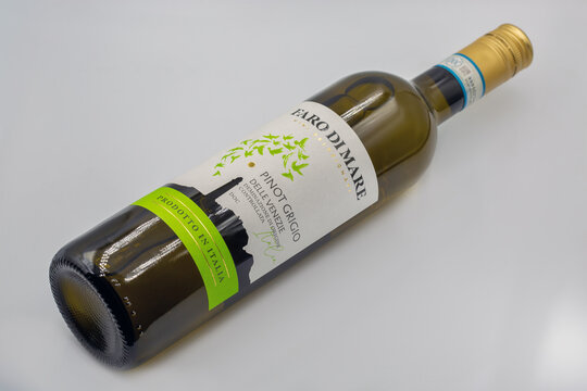 Faro di Mare Pinot Grigio wine bottle closeup on white.