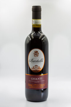 Bartelli Chianti Italian red wine bottle closeup on white.