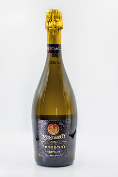 Montasolo Prosecco DOC Treviso Extra Dry bottle closeup on white.