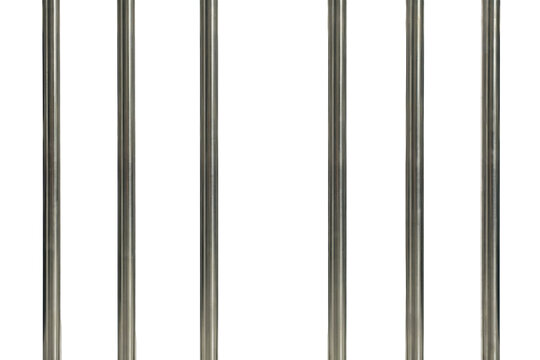 Vertical metal bars forming a prison cell gate or security barrier structure isolated on a transparent background