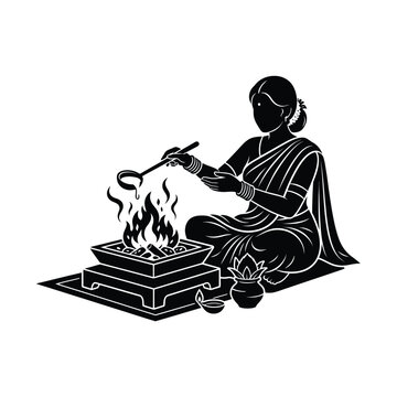 Silhouette of an indian woman performing havan ritual with sacred fire